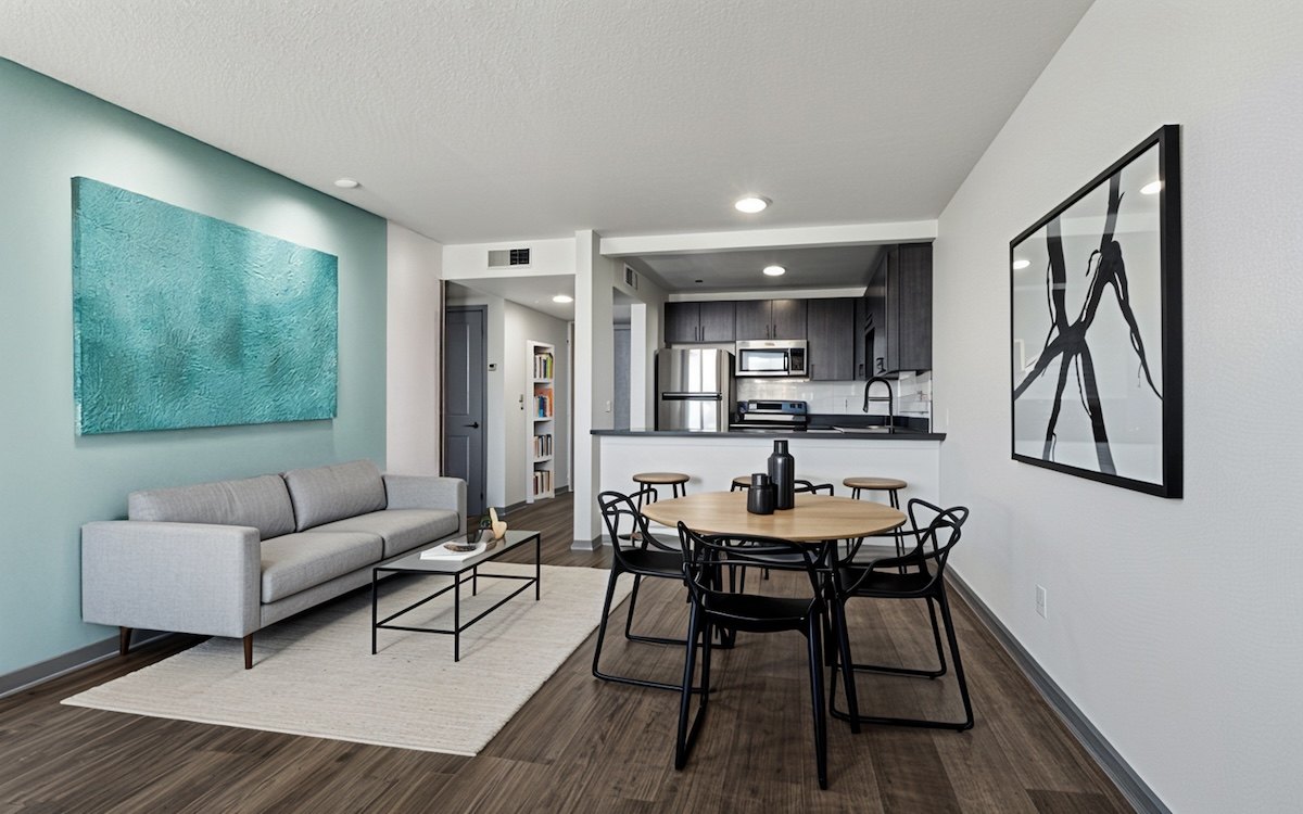 The Canvas apartments living room leading into kitchen